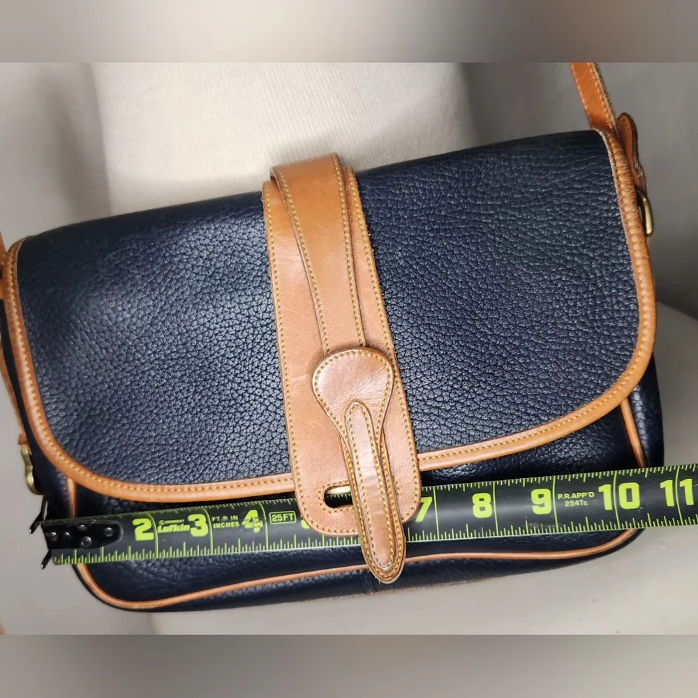 Dooney & Bourke vintage equestrian all weather leather crossbody bag, navy